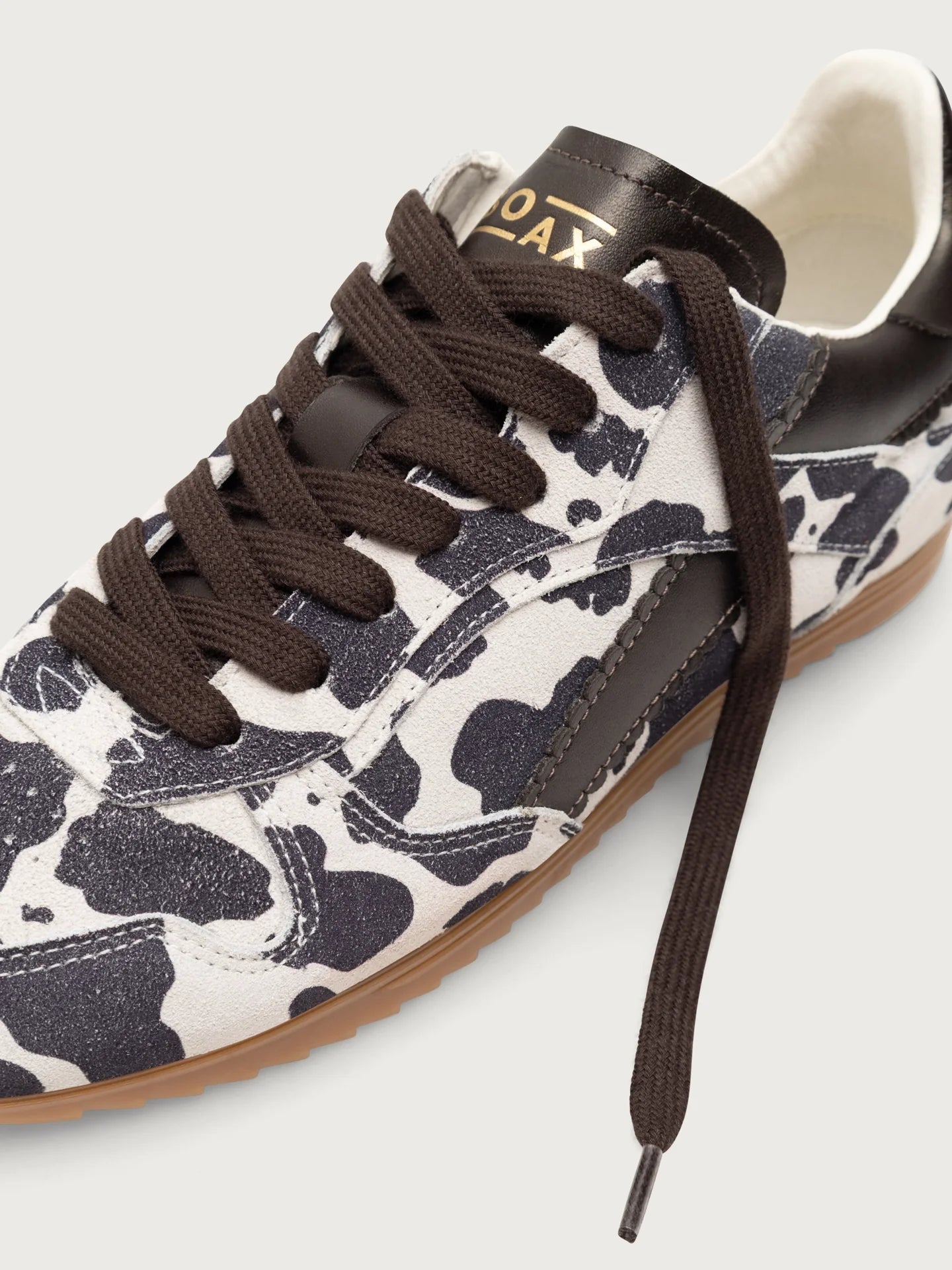 Track 7010 Cow Print Sneaker